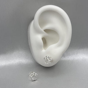 #BR254 - Broquel Huella/Huellita Perro Piedra Zirconia Plata - LL1.7
