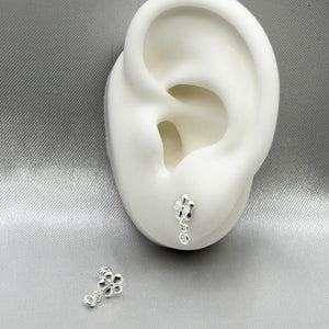 #BR319 - Broquel Flor Con Piedra Zirconia Plata