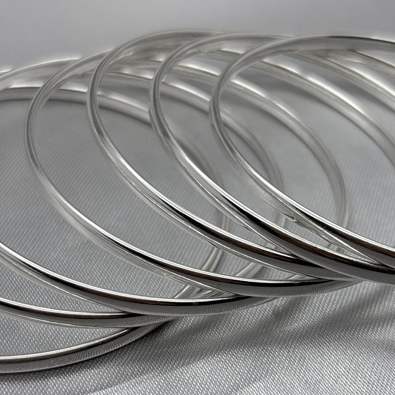 #SE102 - Semanario Circular Liso Terminado Almendrado Plata - CE24.6