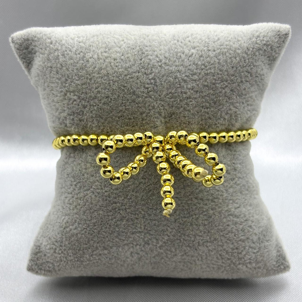 #PAL138 - Pulsera Ajustable Moño De Bolitas Oro Laminado 18K
