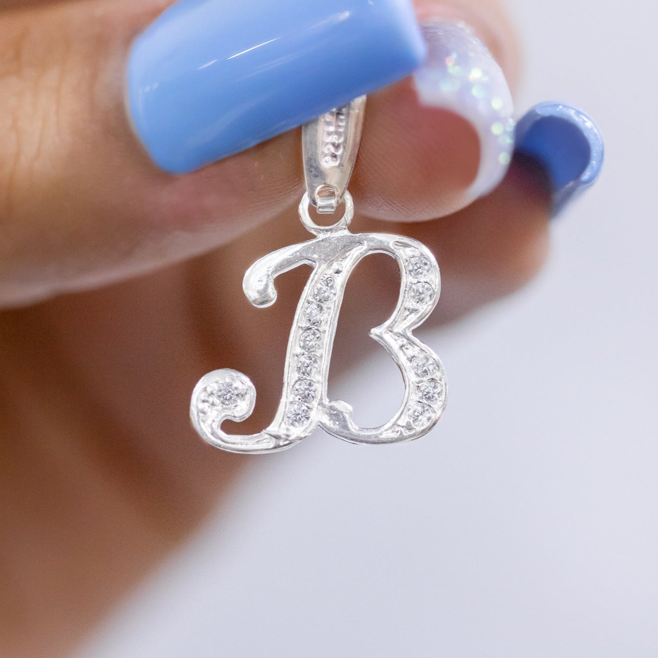 #D116 - Dije De Letra Con Zirconia De Plata - B09/1.5