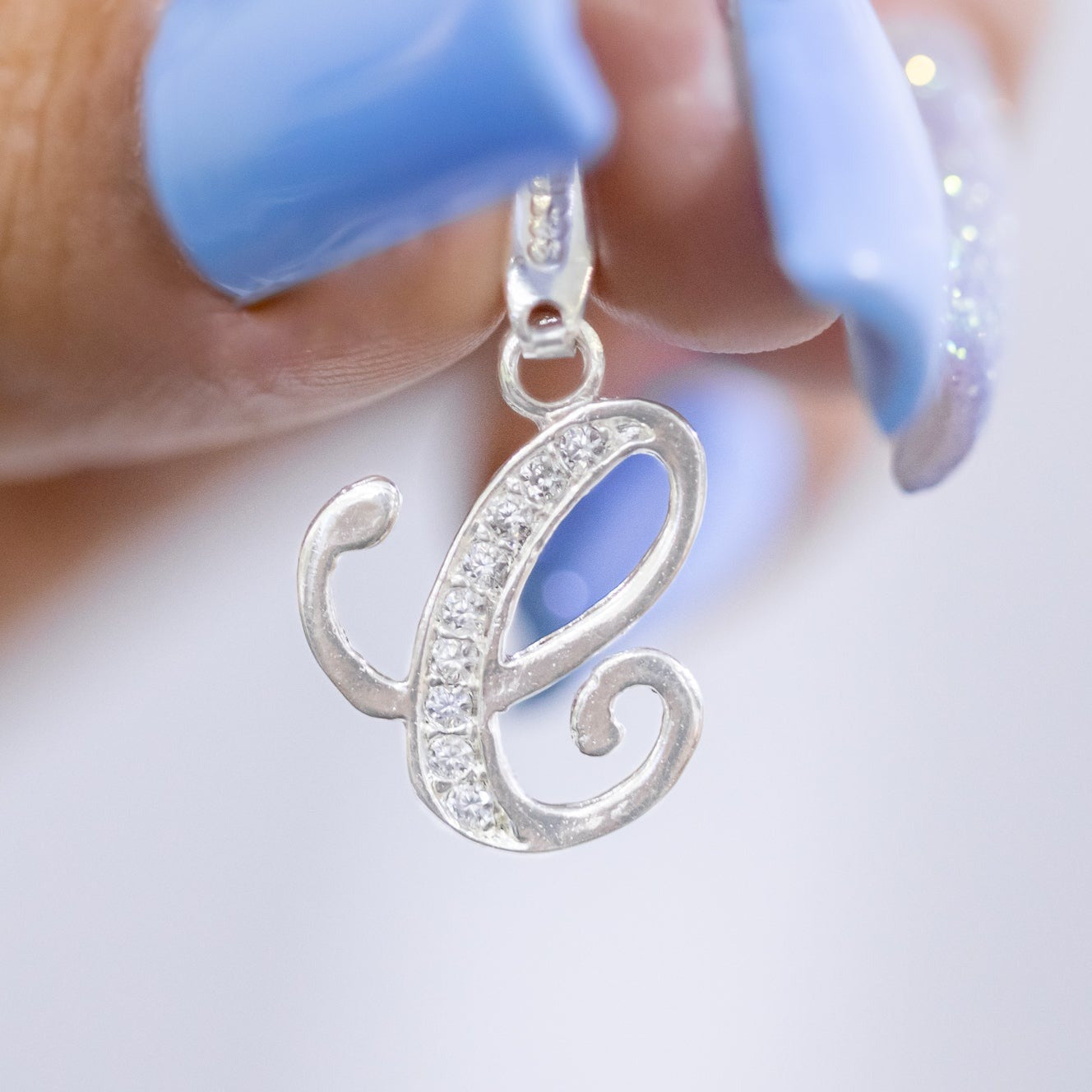 #D116 - Dije De Letra Con Zirconia De Plata - B09/1.5