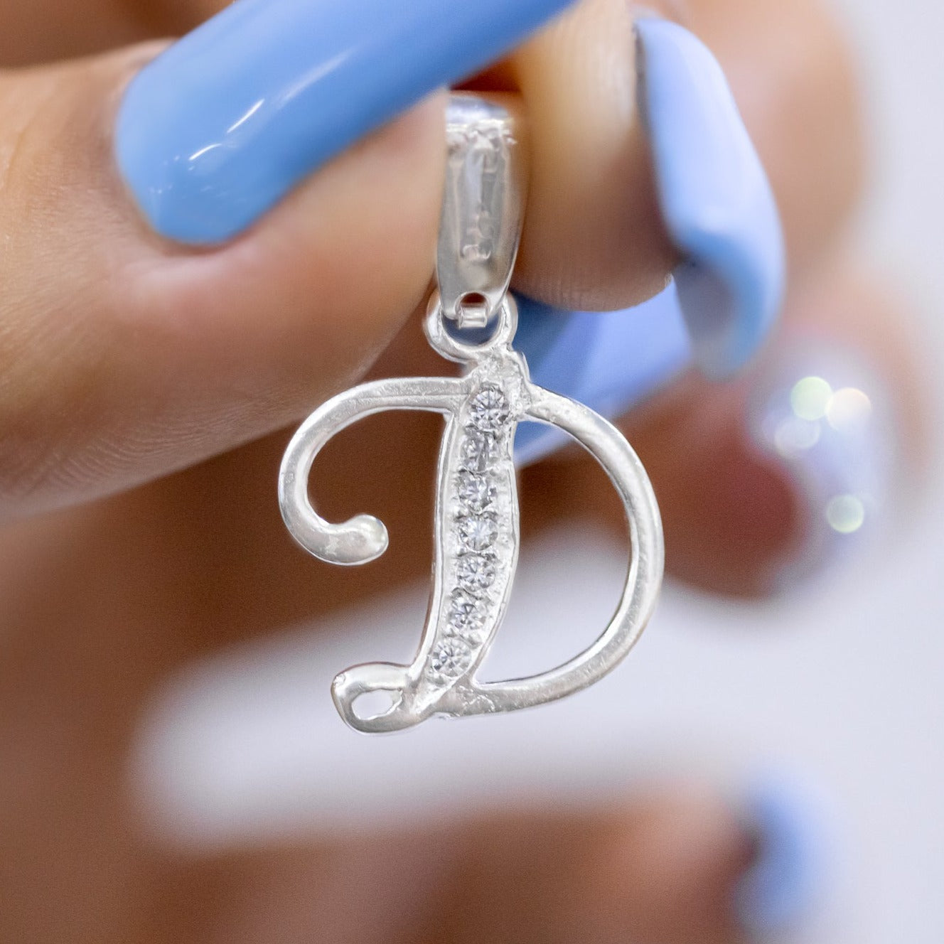 #D116 - Dije De Letra Con Zirconia De Plata - B09/1.5