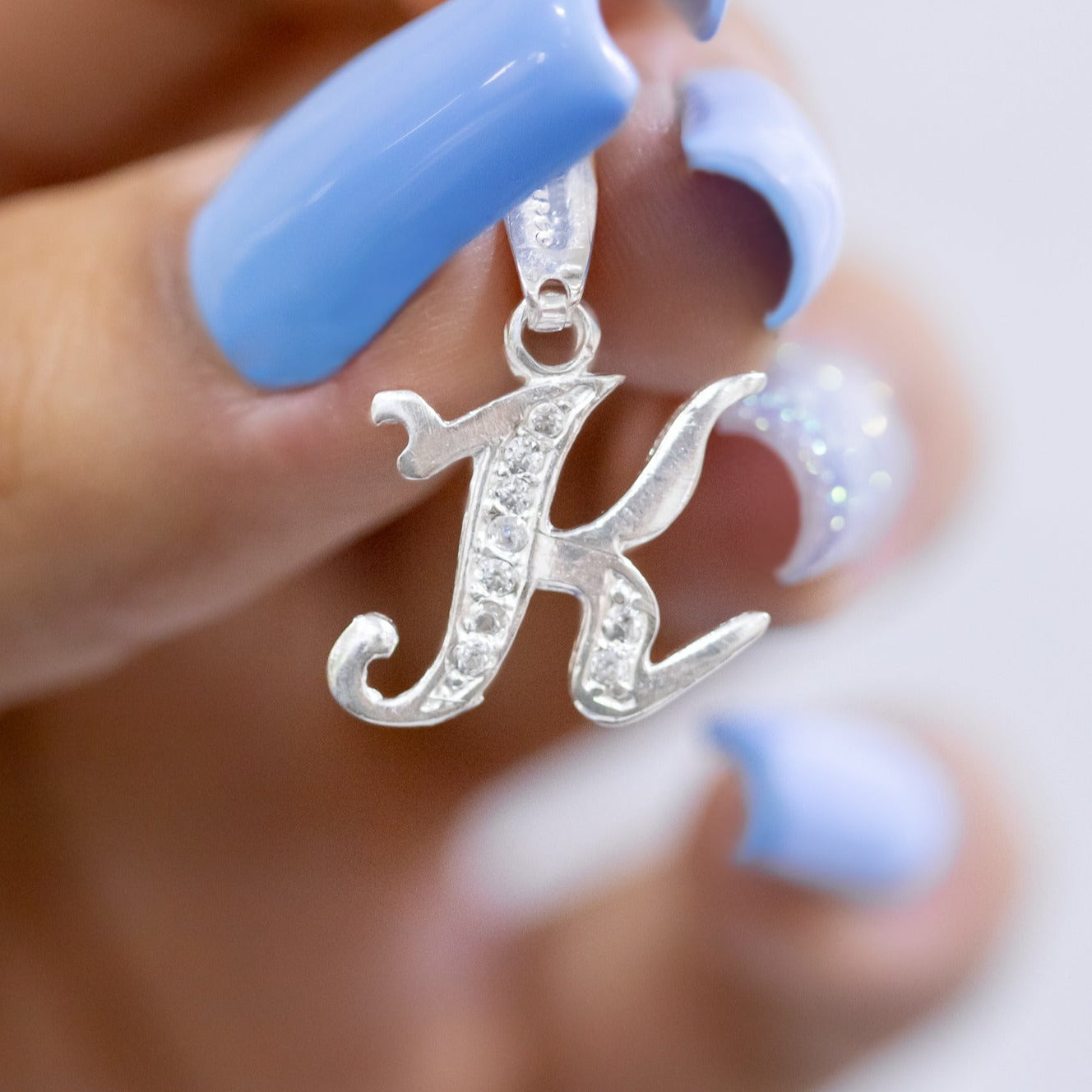 #D116 - Dije De Letra Con Zirconia De Plata - B09/1.5